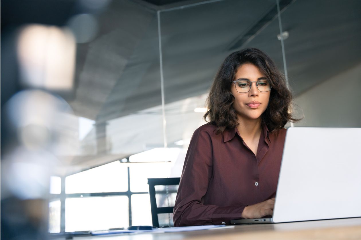 A case handler at work in a bright office