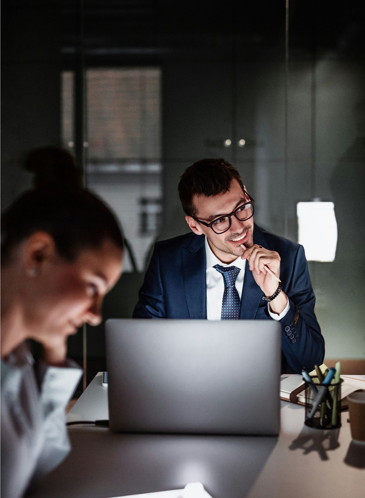 Two lawyers assessing claims together at a desk
